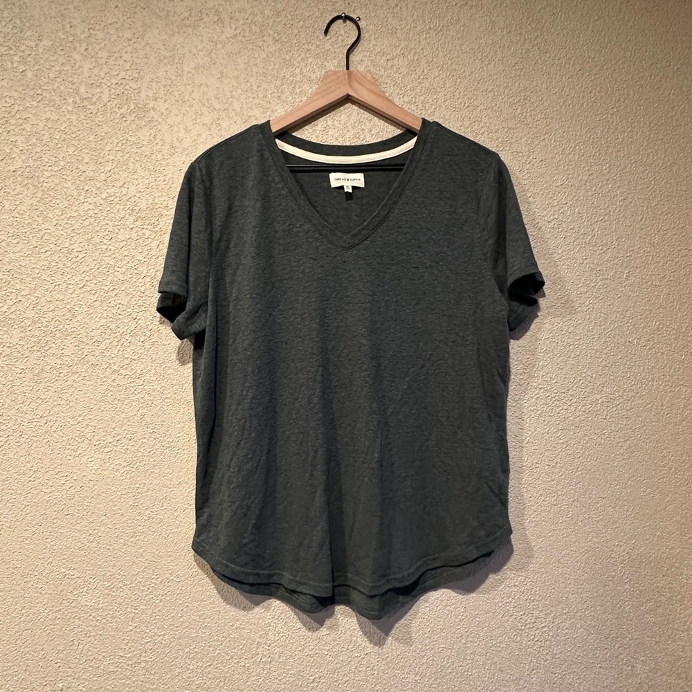 Green v-neck shirt